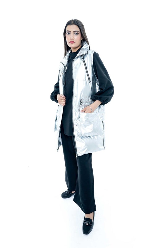 Stylish Silver Quilted Vest with Black Layered Outfit