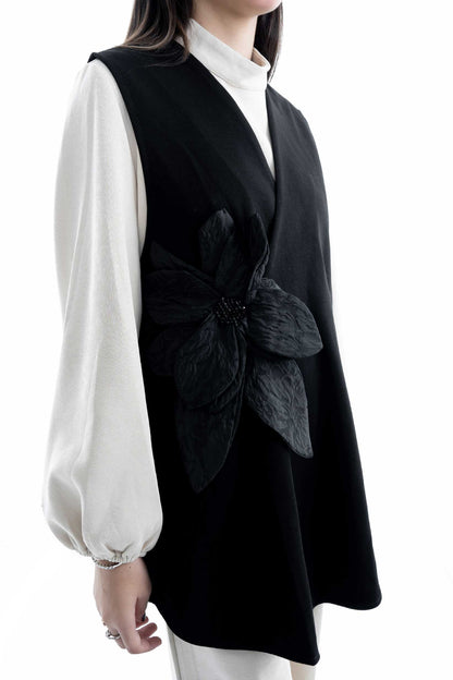 Black Tunic with Floral Accent and Cream Wide-Leg Trousers